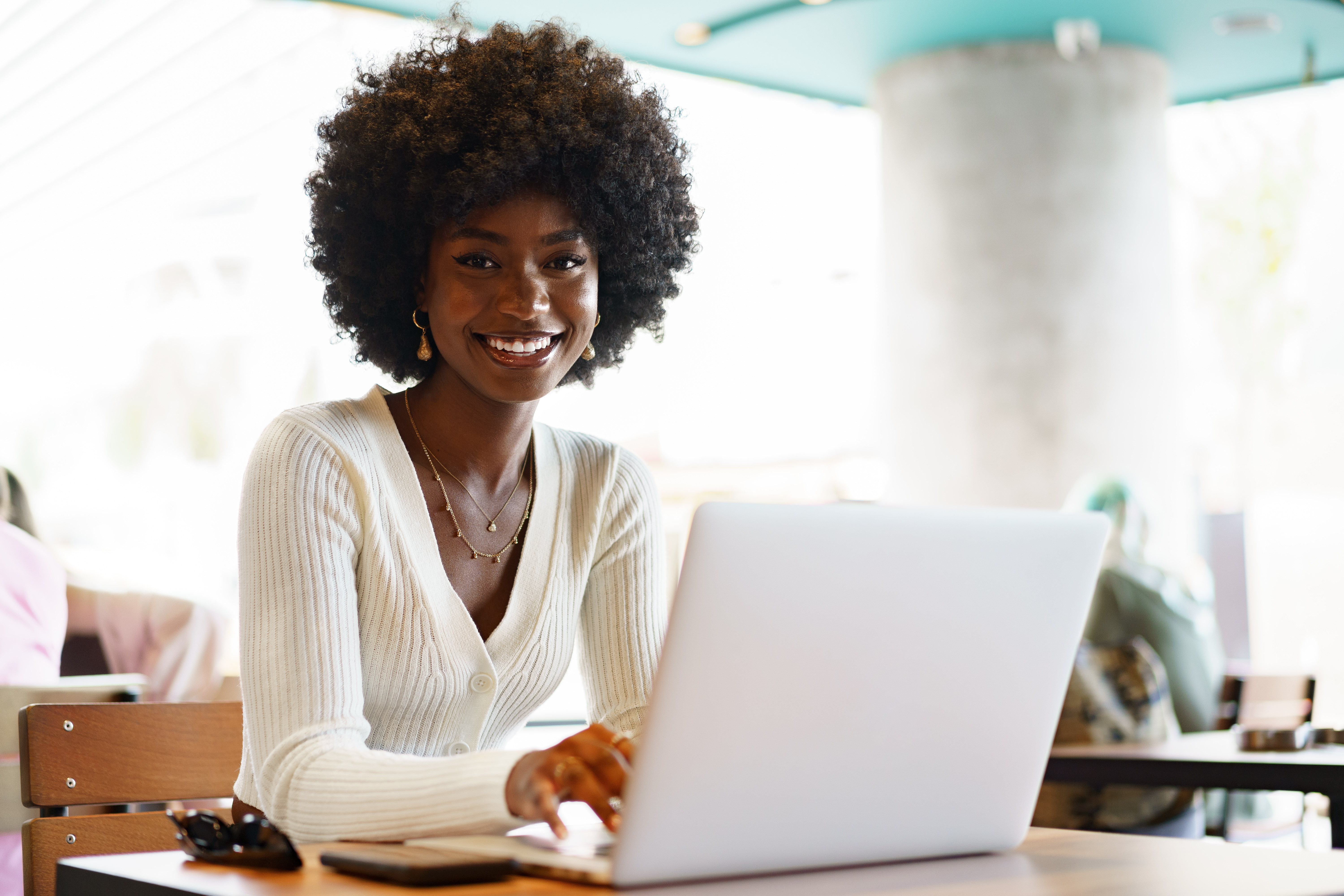 A writer enjoying working on her course