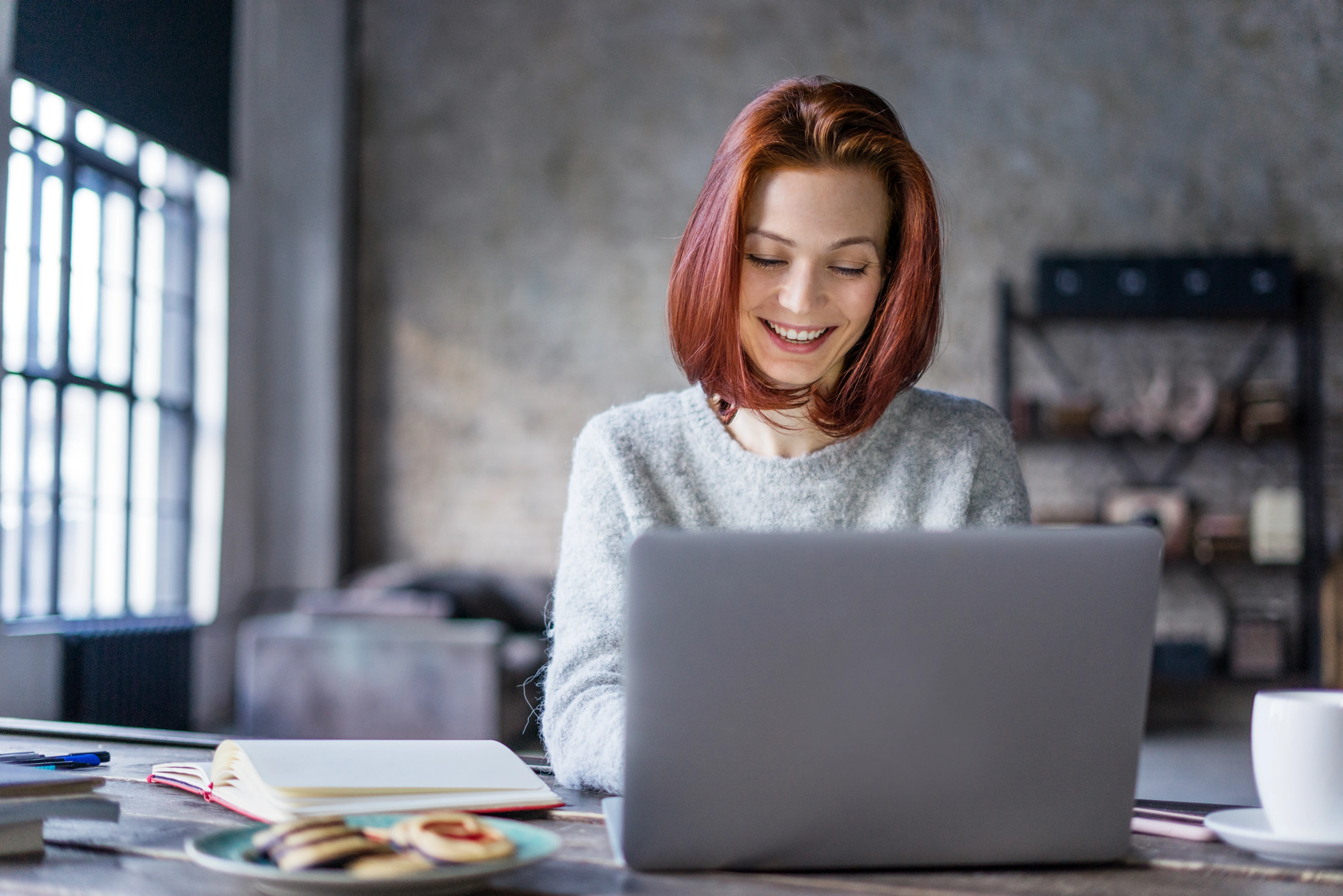 A writer working at her laptop